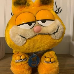 Vintage Garfield wearing Garfield slippers